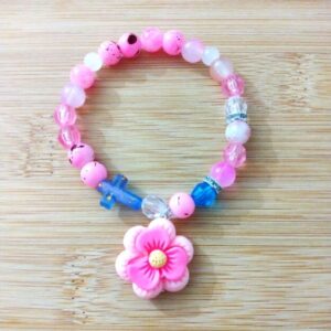 B 25 Handmade beaded bracelet with a flower and cross