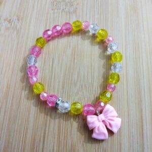 B33 Happy Birthday pink, white & yellow glass bracelet with a bow