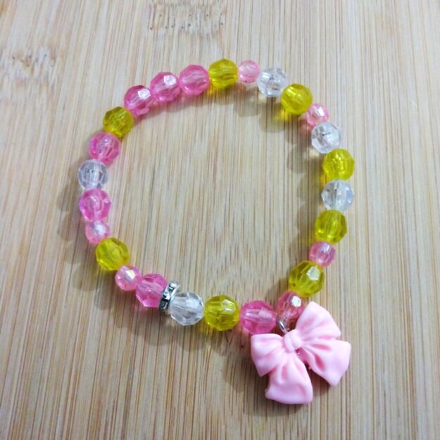 B33 Happy Birthday pink, white & yellow glass bracelet with a bow
