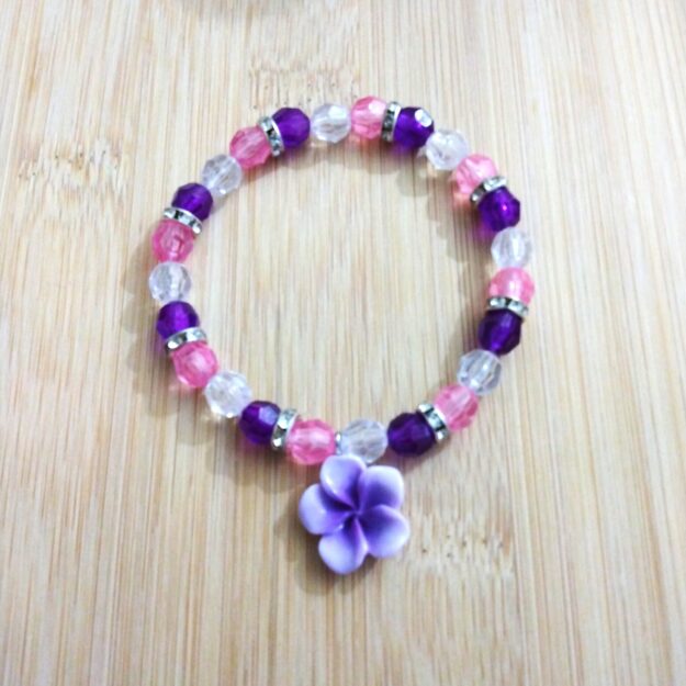 B38 Plum happy Birthday bracelet with a purple flower for her