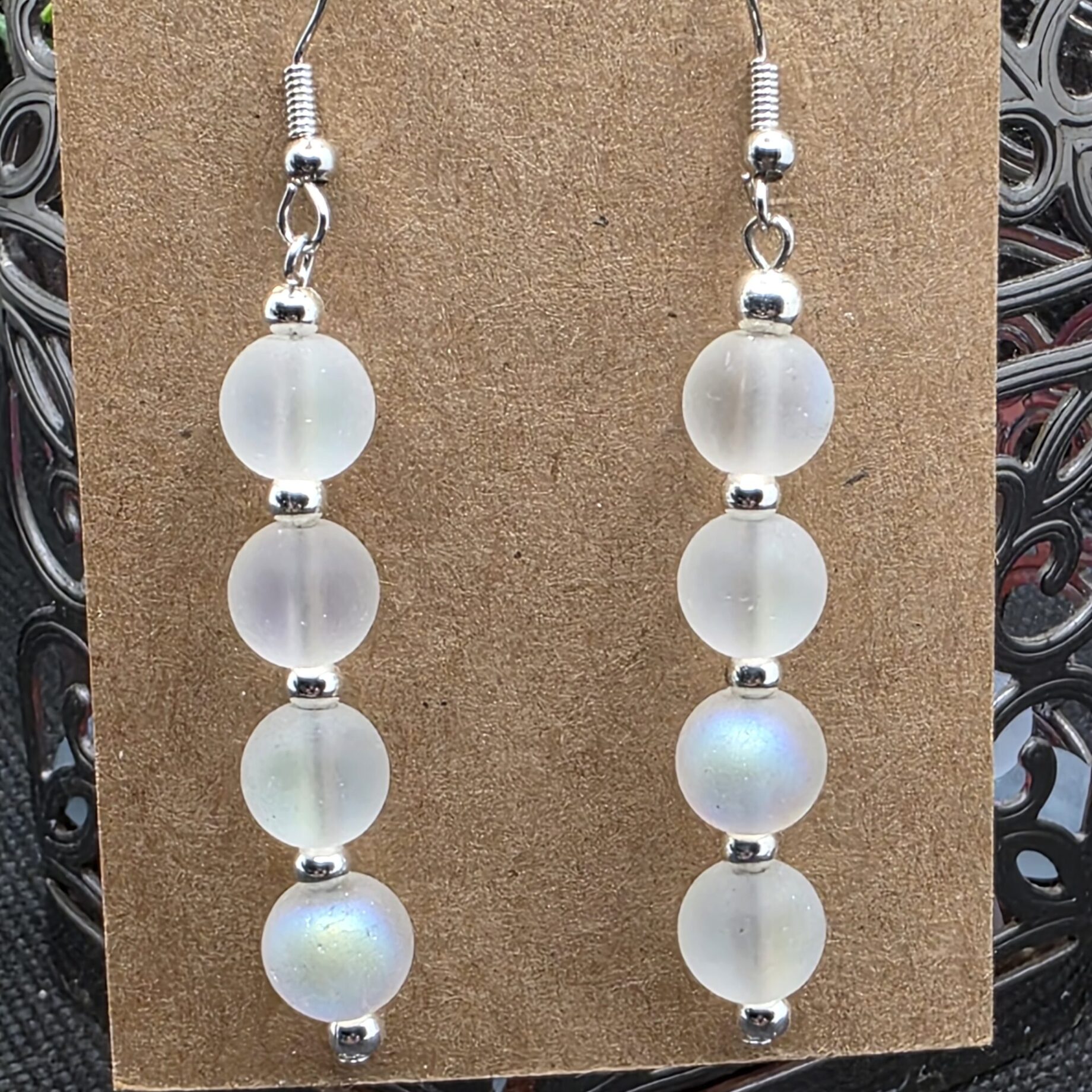 White opalesiant earrings