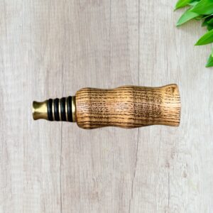 Handcrafted ash wood bottle stopper with brass base